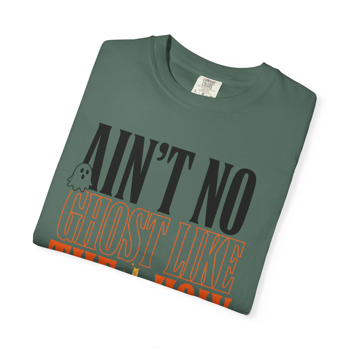 Folded dark green graphic T shirt with bold black and orange lettering reading Aint No Ghost Like the Holy Ghost for a fun womens fashion look