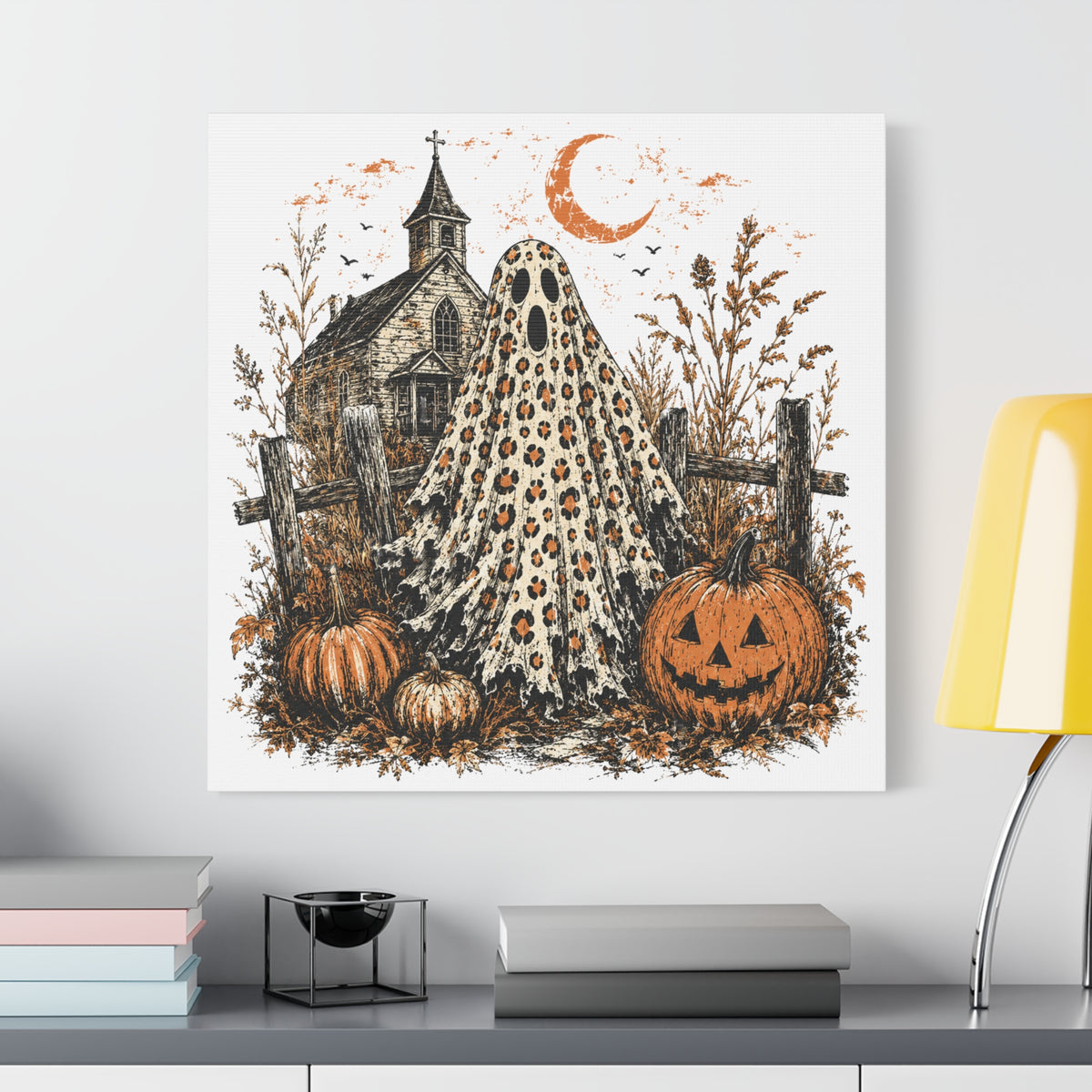 Vintage Halloween wall art showing a leopard print ghost among pumpkins beside a spooky wooden church beneath a crescent moon in a rustic autumn scene