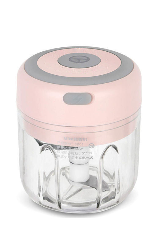 Pink mini electric USB garlic chopper with a clear bowl and stainless steel blades for quickly mincing garlic herbs and vegetables with one touch