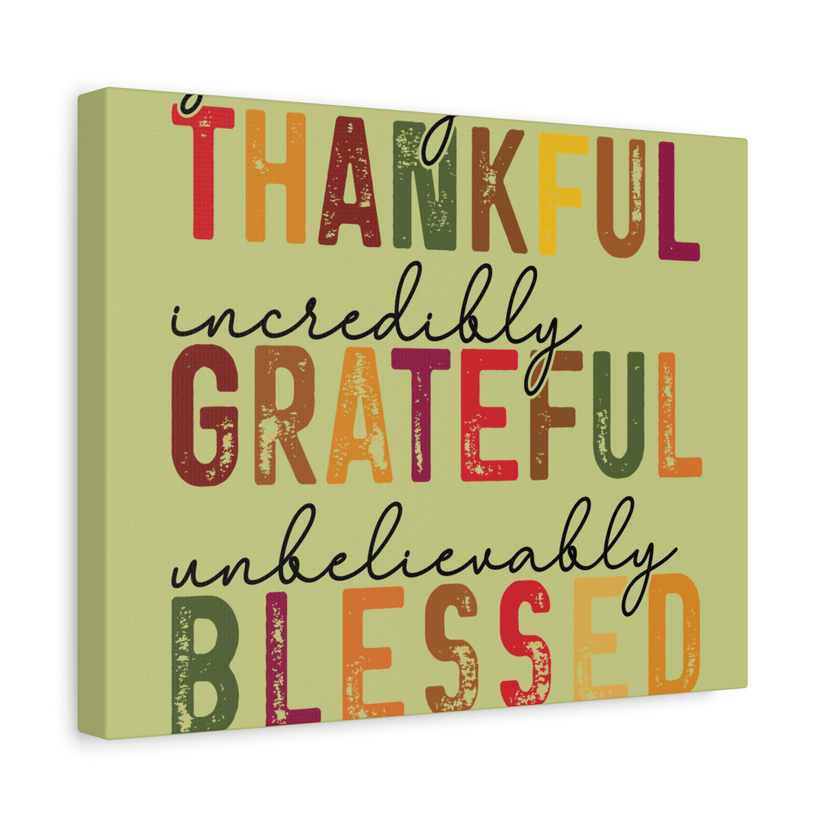 Stretched matte canvas wall art with colorful distressed autumn lettering that reads Thankful incredibly Grateful unbelievably Blessed