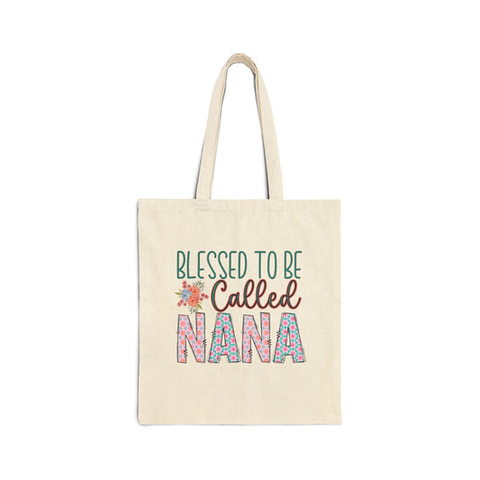 Natural cotton canvas tote bag with long handles and colorful floral lettering that reads Blessed to Be Called Nana for a meaningful everyday accessory