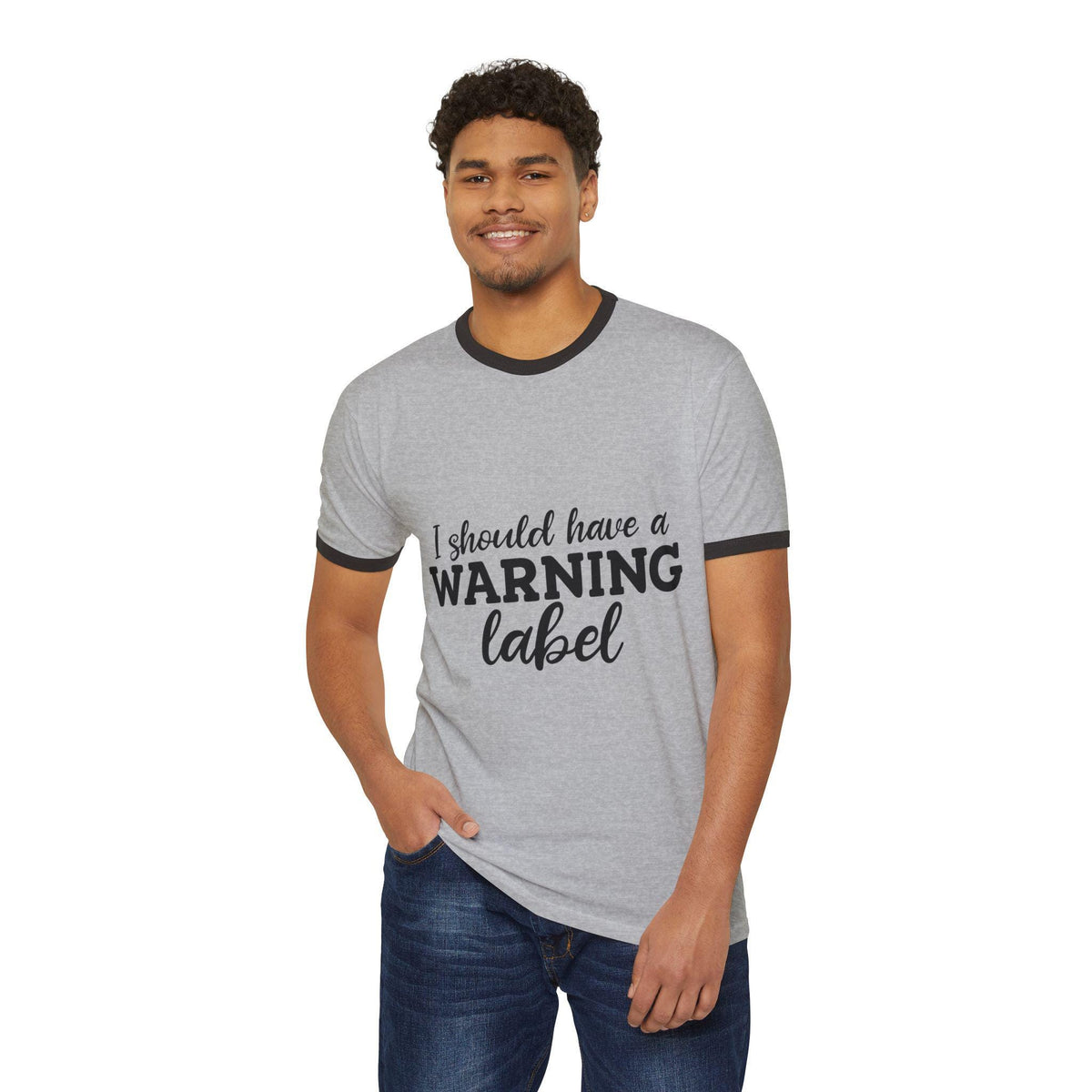 Model wearing a gray vintage style ringer tee with black ribbed trim and an I should have a warning label graphic from Drizzle and Tizzle