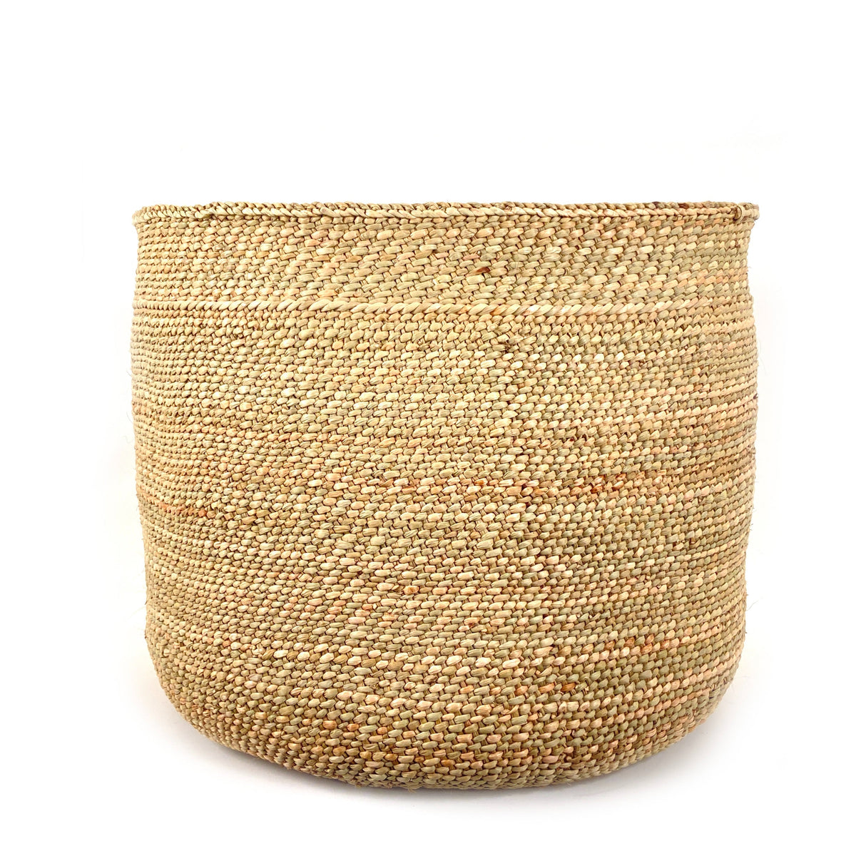 Natural woven Iringa basket made from Milulu grass for stylish home decor and storage from DC-Powered by People in the Home and beyond collection