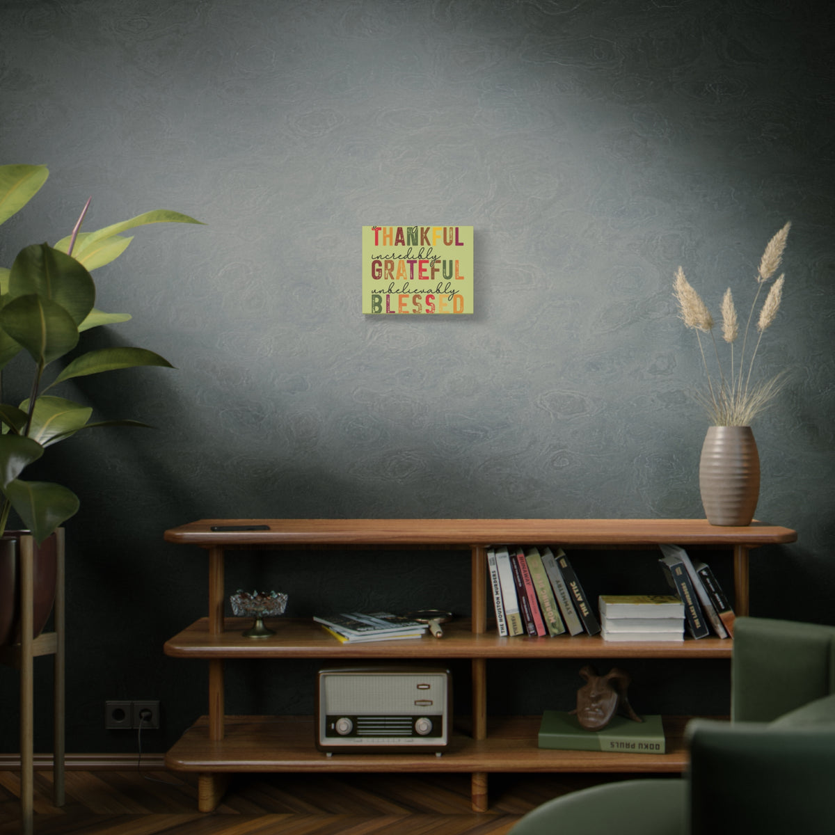 Distressed autumn canvas wall art reading Thankful Grateful Blessed above a wooden console in a cozy living room with plants and dried flowers