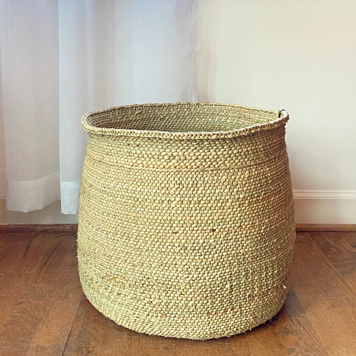 Large natural woven Iringa basket made from Milulu grass for stylish home decor from DC-Powered by People in the Home and beyond collection