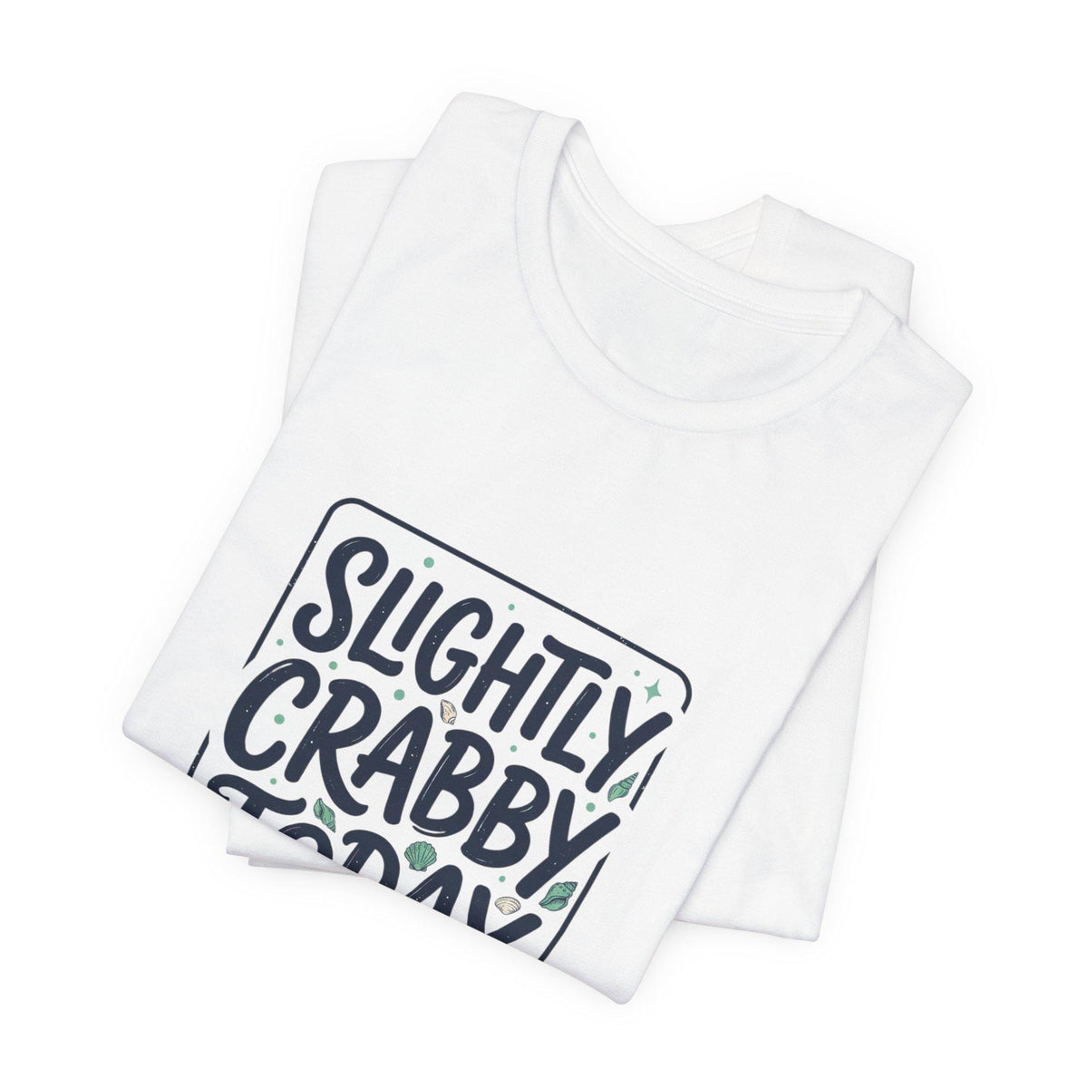 Folded white graphic T shirt featuring playful Slightly Crabby Today lettering and a cheerful cartoon crab design for coastal summer style