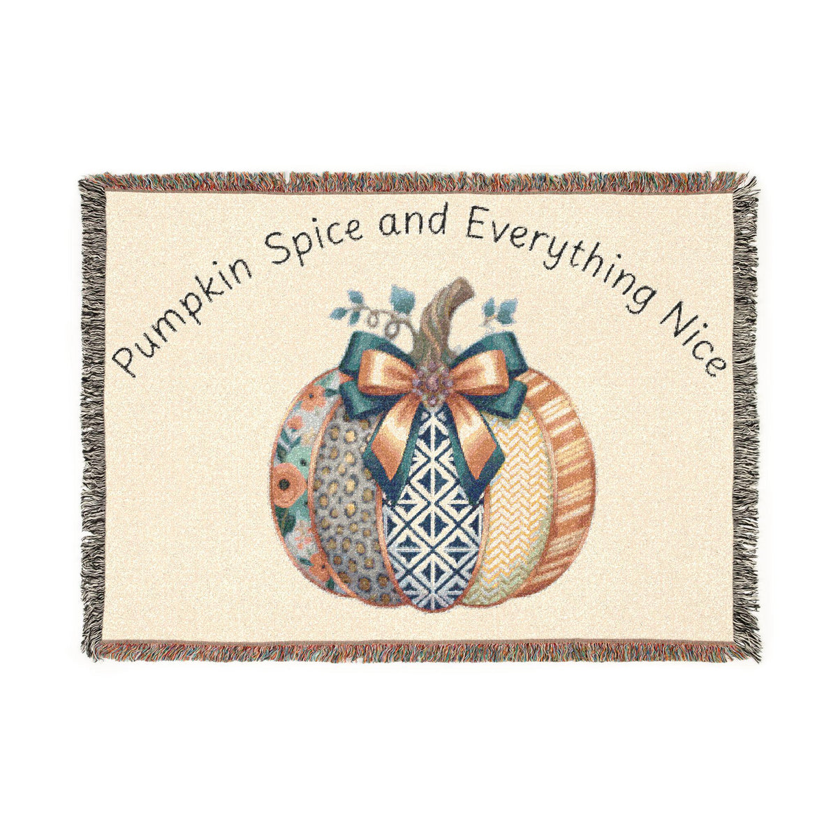 Woven autumn throw blanket with three patterned pumpkins and a bow beneath Pumpkin Spice and Everything Nice lettering from Drizzle & Tizzle for Home & beyond