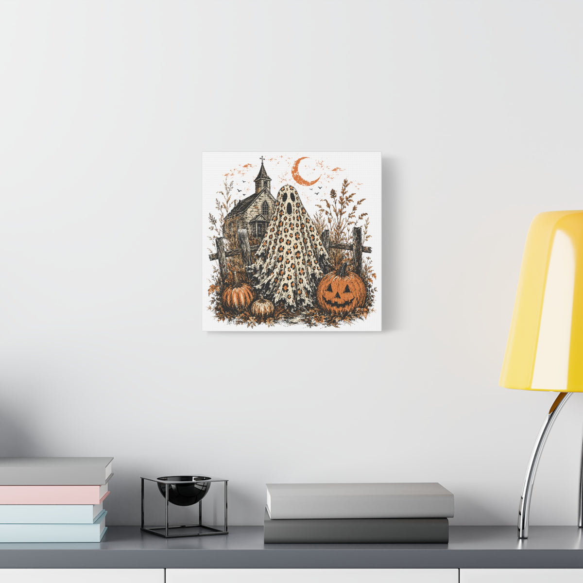 Vintage Halloween canvas wall art featuring a leopard print ghost with pumpkins and a spooky church beneath a crescent moon in seasonal home decor by Printify