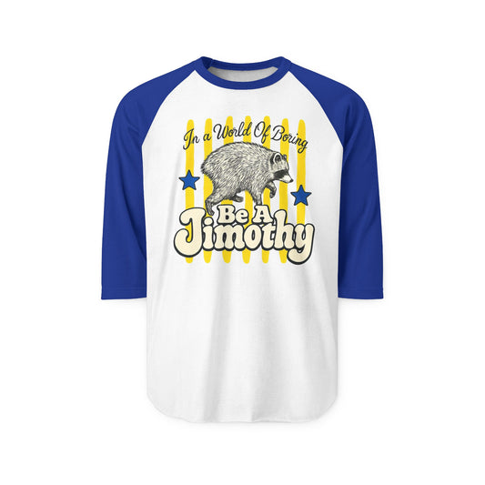 White and blue three quarter sleeve raglan shirt with a vintage raccoon graphic and Be A Jimothy lettering for women's fashion graphic tee style lovers