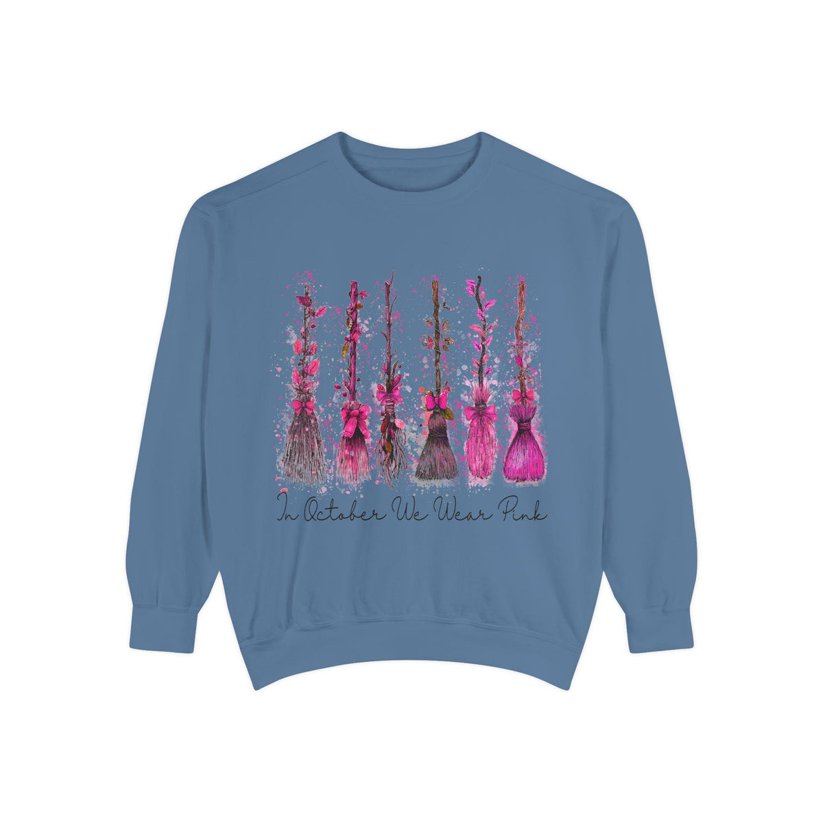 Blue crewneck sweatshirt with pink floral artwork and the message In October We Wear Pink for a women's breast cancer awareness look