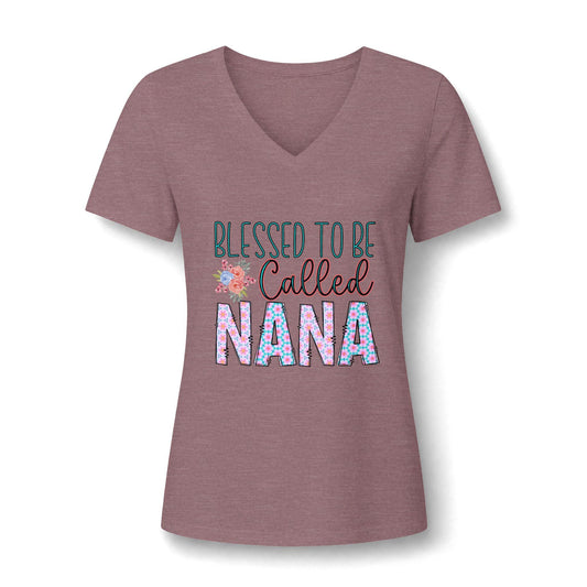 Mauve women's V neck graphic tee featuring Blessed to Be Called Nana lettering with colorful floral accents and a relaxed silhouette for casual everyday wear