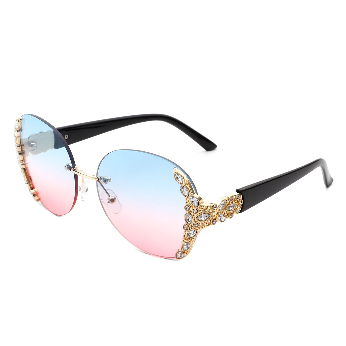 Oversized rimless round sunglasses with blue to pink gradient lenses ornate rhinestone gold detailing and black temples from Cramilo Eyewear jewelry collection