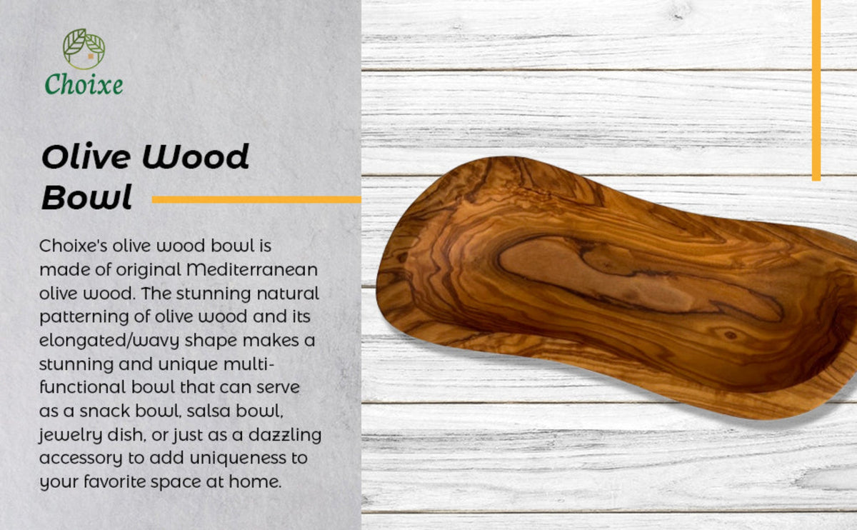 Elongated natural olive wood bowl with rich swirling grain shown on a white wood surface for snacks salsa or home decor by DC Choixe from Home and beyond