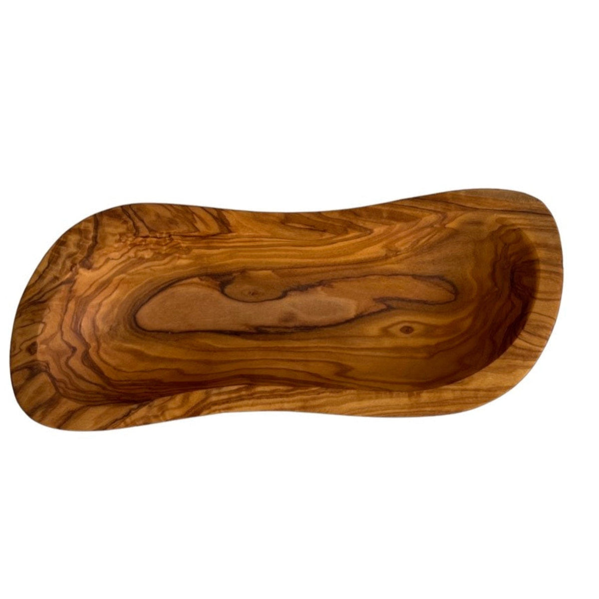 Elongated Mediterranean olive wood serving bowl with rich natural grain for snacks or salsa from DC Choixe in the Home and beyond home decor collection