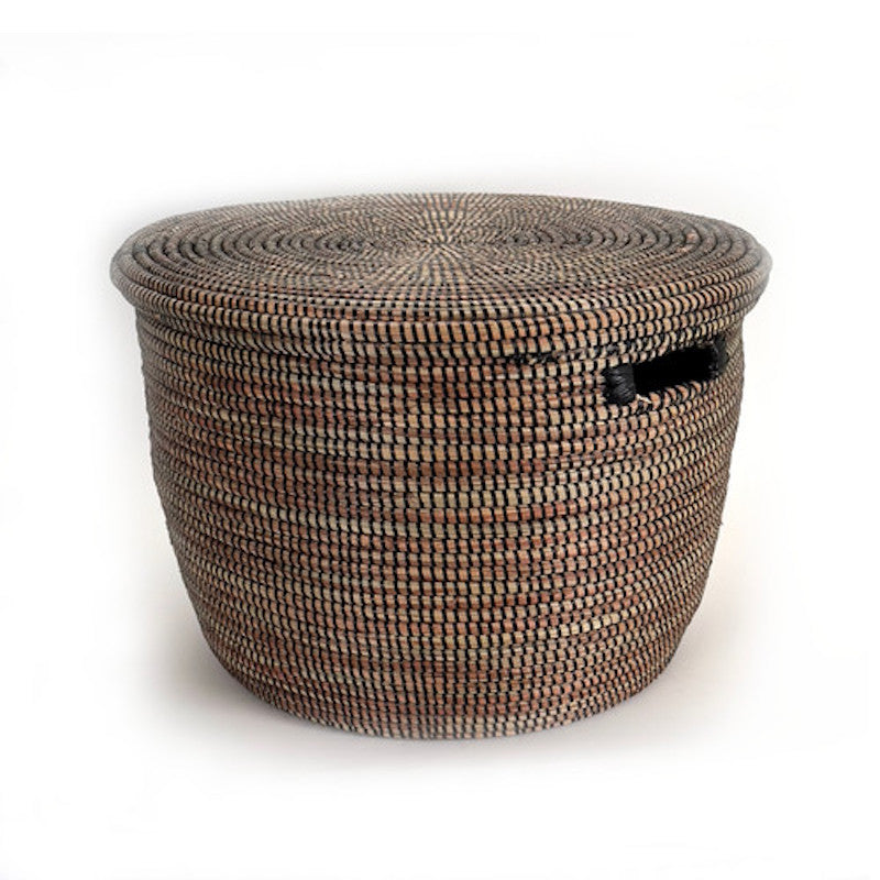 Handwoven black lidded floor basket with a flat lid and side handles for stylish storage and minimalist home decor by DC-Powered by People from Home and beyond
