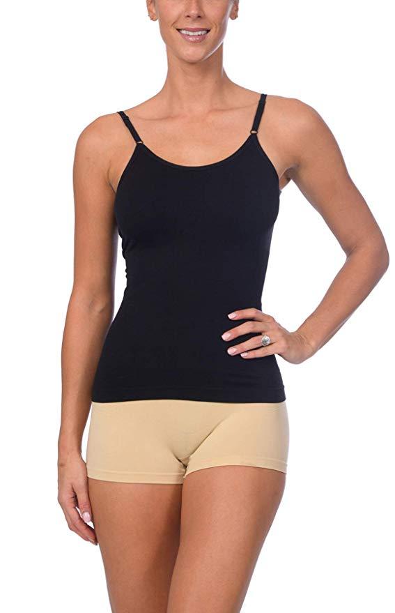 Model wearing a black seamless shaping camisole with adjustable straps and beige shorts from Body Beautiful Shapewear Athletics collection