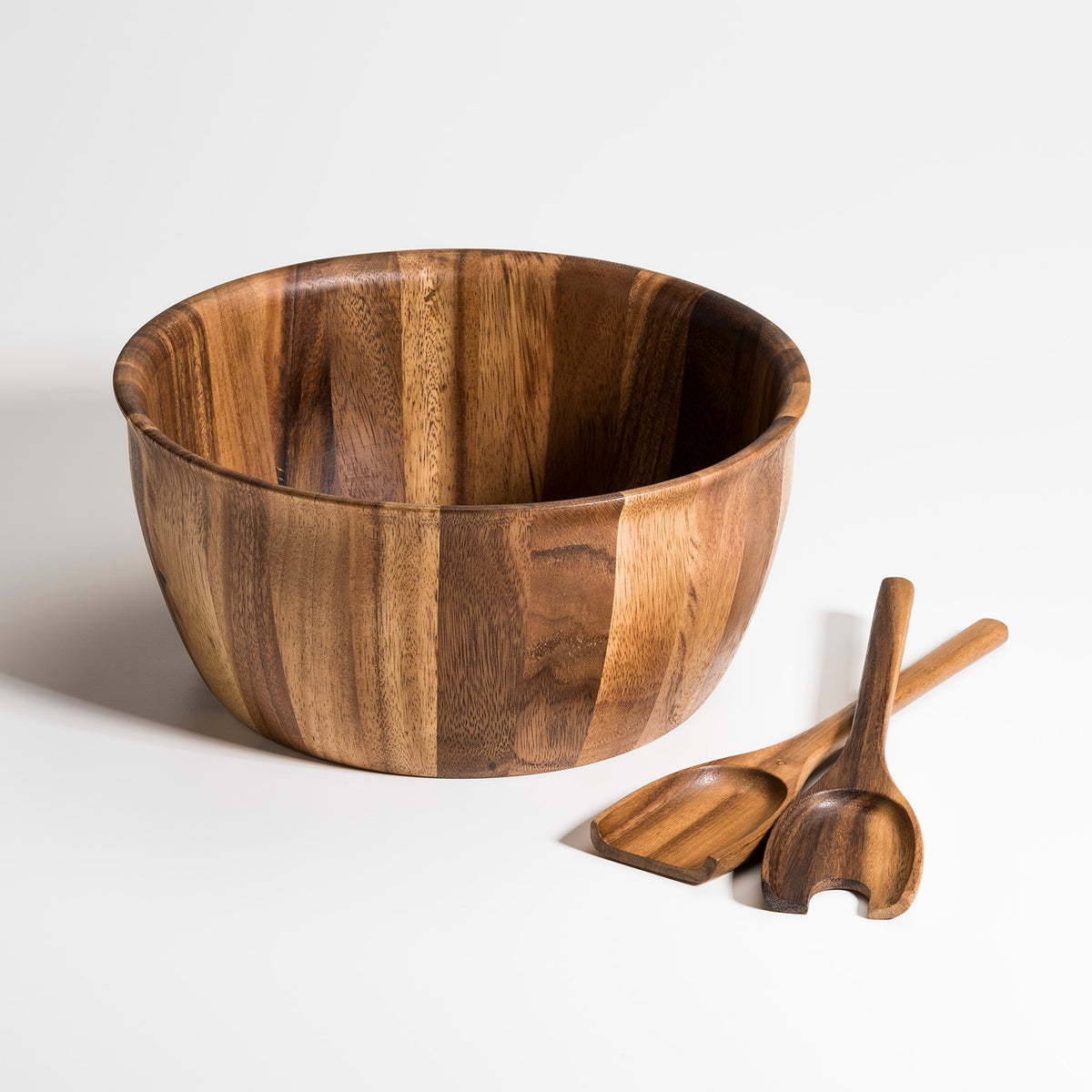 Large acacia wood salad bowl with matching serving utensils for stylish home dining from DC-Kalmar Home in Home and beyond