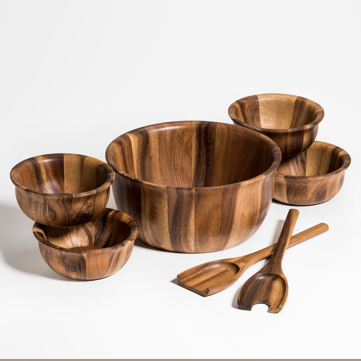Wooden salad bowl set with one large bowl four matching individual bowls and serving utensils from DC Kalmar Home for home decor collections