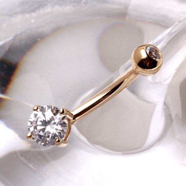 14 karat gold navel ring with a prong set round cubic zirconia stone from Fashion Hut Jewelry in the Jewelry collection