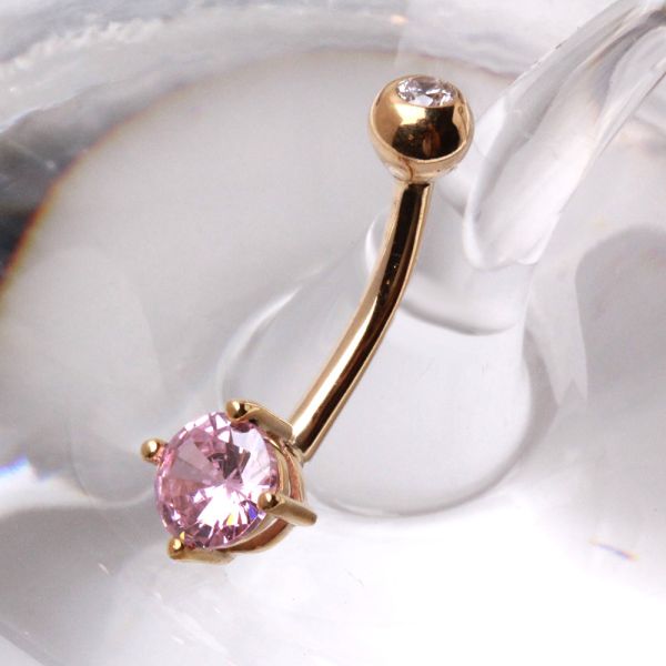 14 karat yellow gold navel ring with a prong set round pink cubic zirconia stone by Fashion Hut Jewelry from the Jewelry collection